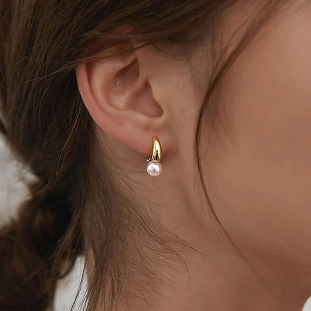 Boucles d'oreilles perle dorée unique