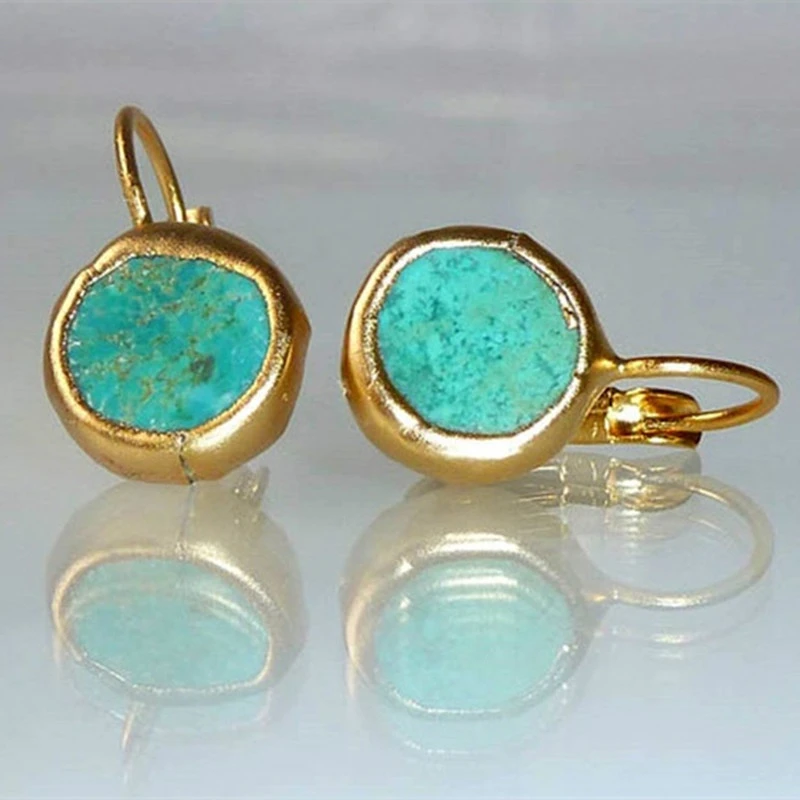 Boucles d'oreilles élégantes en or avec une turquoise exceptionnelle