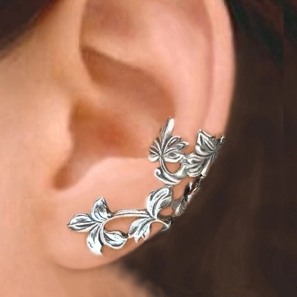 Boucles d'oreilles en argent vintage avec motif de feuille