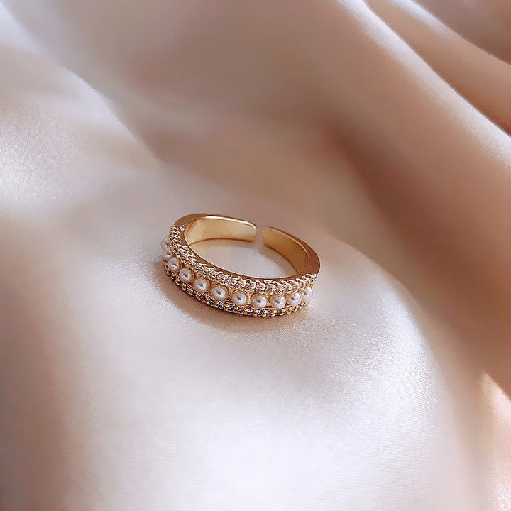 Bague de luxe en perles et or au design exclusive élégante
