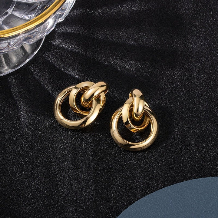 boucles d'oreilles en or exclusives au design luxueux