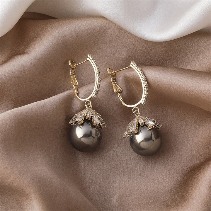 Boucles d'oreilles élégantes Malia avec perles pour un look sophistiqué
