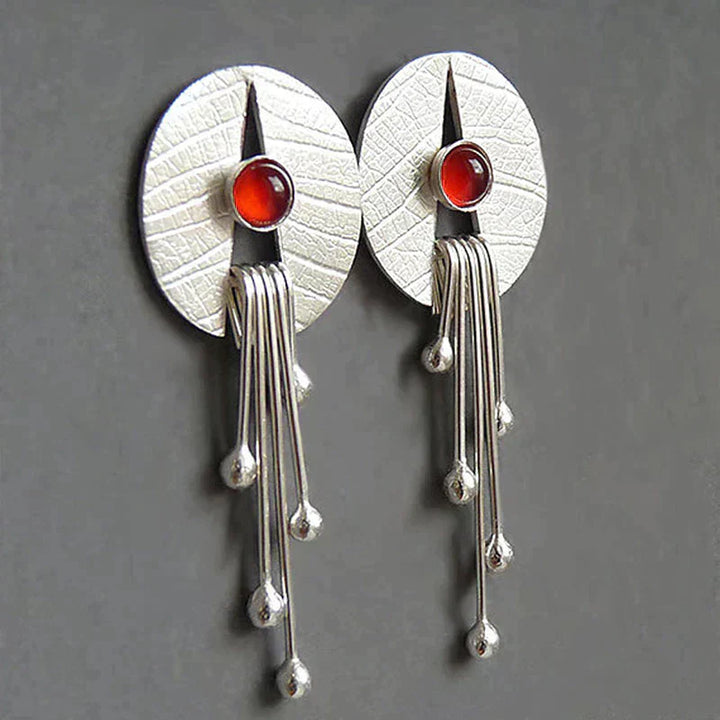 Boucles d'oreilles élégantes et exquises en pierre rouge