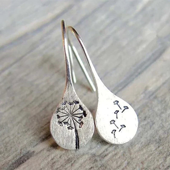 Boucles d'oreilles exclusives en argent avec feuilles de dent de lion