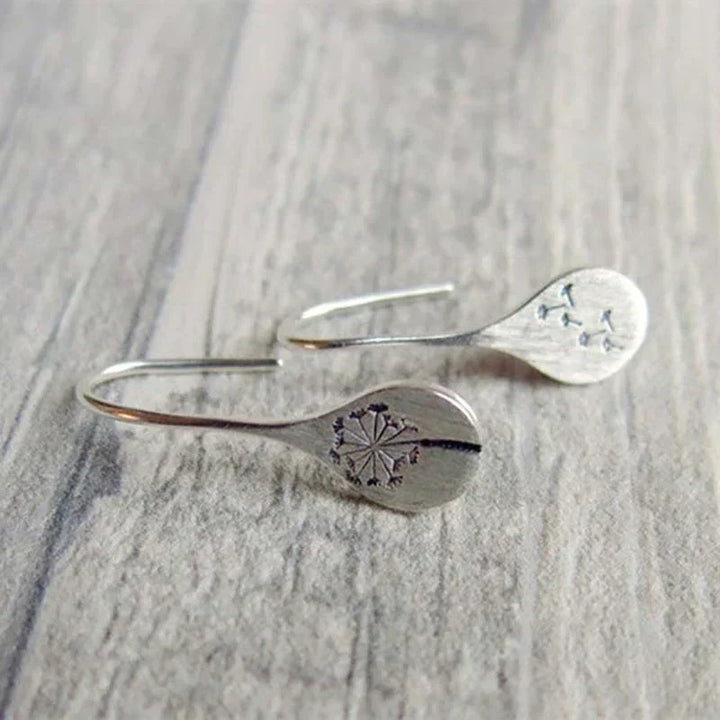 Boucles d'oreilles exclusives en argent avec feuilles de dent de lion