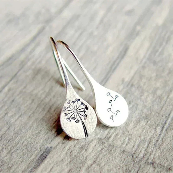 Boucles d'oreilles vintage en argent avec motif floral