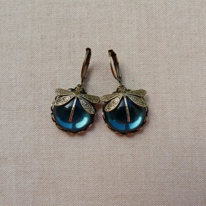 Boucles d'oreilles en or antique avec libellule