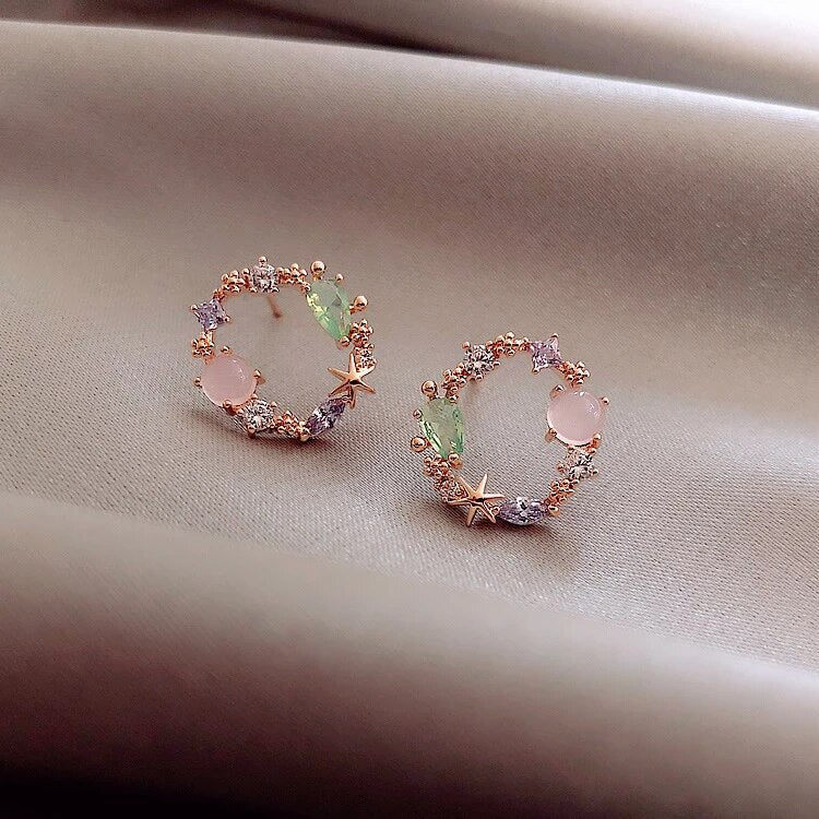 Boucles d'oreilles florales en cristal or rose