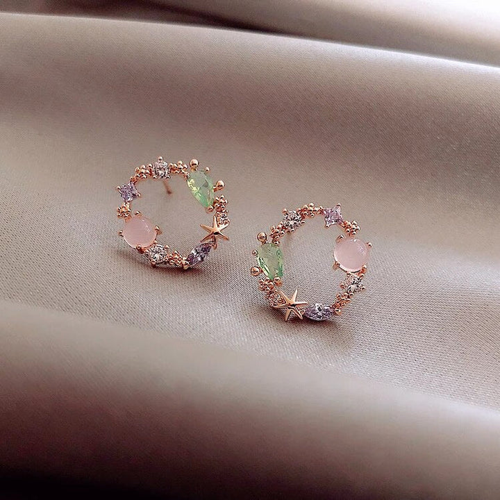 Boucles d'oreilles florales en cristal or rose