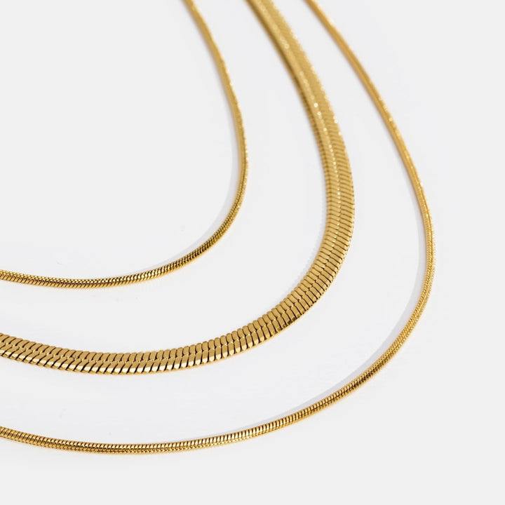 Collier à Chaîne Multistrat Élégant en Or Doré
