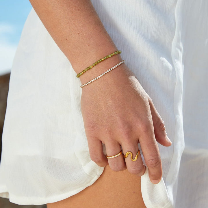 Bague Onda Dorée Étincelante pour un Style Chic et Élégant