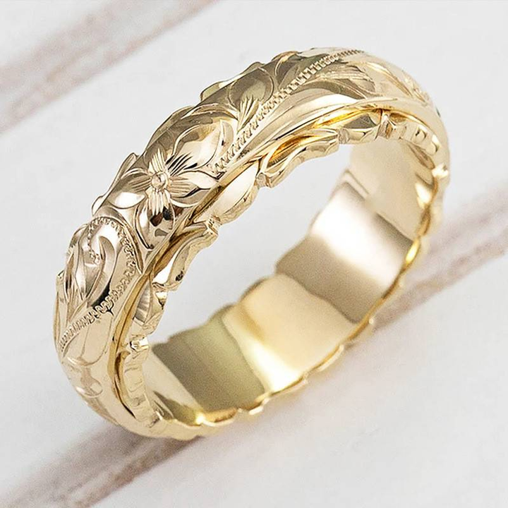 Bague à motif de fleur en or ancien