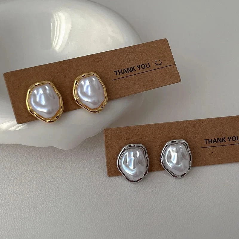 Boucles d'oreilles avec des perles élégantes de Carmen