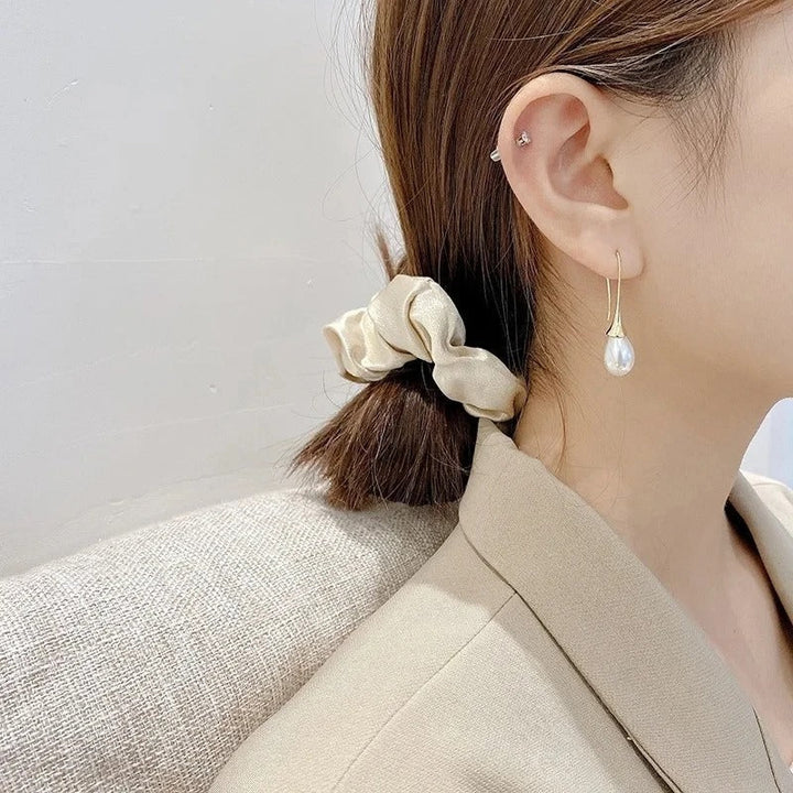 Boucles d'oreilles classiques en perles originales Helena